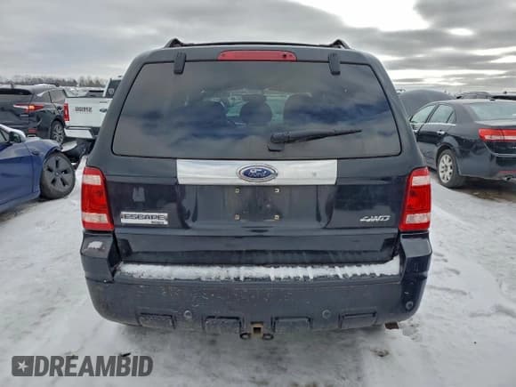✅ 2009 Ford Escape Limited • VIN: 1FMCU94G59KA14003 • Lot: 95220075. Listed on Copart with 96,008 mi. Free auction sales archive from the USA and detailed vehicle history report at DreamBid. Image 6.