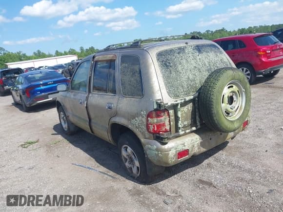 ✅ 2002 Kia Sportage • VIN: KNDJB723525120932 • Lot: 42257638. Wystawiony na IAAI z przebiegiem 84 009 mil. Bezpłatny archiwum sprzedaży aukcyjnych z USA i szczegółowy raport historii pojazdu na DreamBid. Zdjęcie 3.