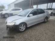 ✅ 2003 Mitsubishi Lancer OZ-Rally • VIN: JA3AJ86E93U109636 • Lot: 70269295. Listed on Copart with 186,742 mi. Free auction sales archive from the USA and detailed vehicle history report at DreamBid. Image 1.