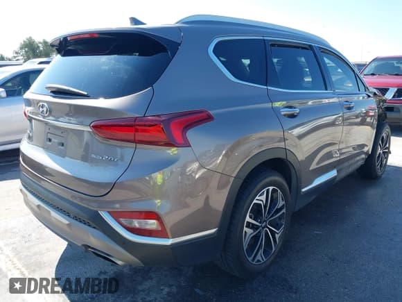 ✅ 2019 Hyundai Santa Fe Limited • VIN: 5NMS5CAA8KH036668 • Лот: 43544647. Опубликован ранее на IAAI с пробегом 82 738 миль. Бесплатный доступ к архиву аукционных продаж из США и подробный отчёт об истории автомобиля на DreamBid. Изображение 4.