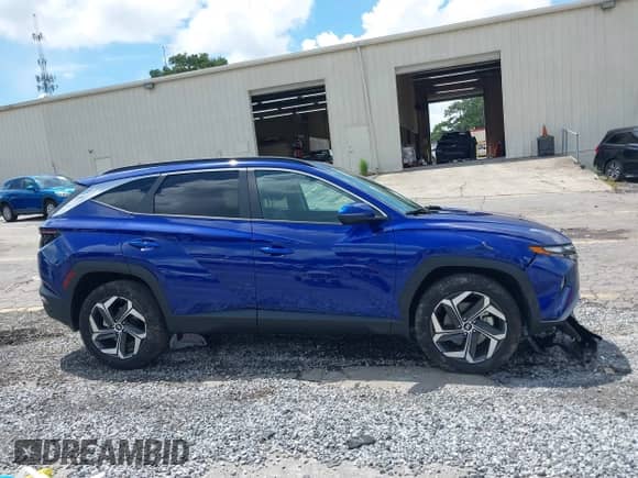 2023 Hyundai Tucson SEL z VIN 5NMJFCAE4PH196713, wystawiony jako IAAI lot #42949944 z przebiegiem 22 921 mil mil oraz . Historia ofert i sprzedaży dostępna na DreamBid. Obrazek 13.