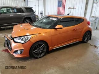 ✅ 2015 Hyundai Veloster Turbo • VIN: KMHTC6AE7FU225062 • Lot: 82557604. Wystawiony na Copart z przebiegiem 98 696 mil. Bezpłatny archiwum sprzedaży aukcyjnych z USA i szczegółowy raport historii pojazdu na DreamBid. Zdjęcie 1.