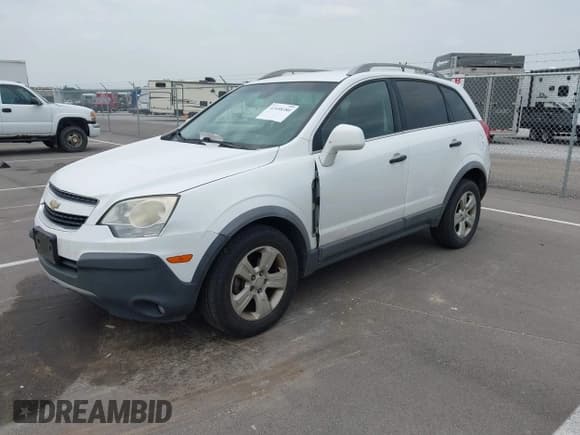 ✅ 2013 Chevrolet Captiva Sport LS • VIN: 3GNAL2EK2DS553868 • Lot: 42458380. Wystawiony na IAAI z przebiegiem 163 429 mil. Bezpłatny archiwum sprzedaży aukcyjnych z USA i szczegółowy raport historii pojazdu na DreamBid. Zdjęcie 2.