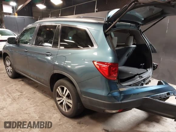 ✅ 2018 Honda Pilot EX-L • VIN: 5FNYF6H7XJB053927 • Лот: 40659757. Опубликован ранее на IAAI с пробегом 125 182 миль. Бесплатный доступ к архиву аукционных продаж из США и подробный отчёт об истории автомобиля на DreamBid. Изображение 3.