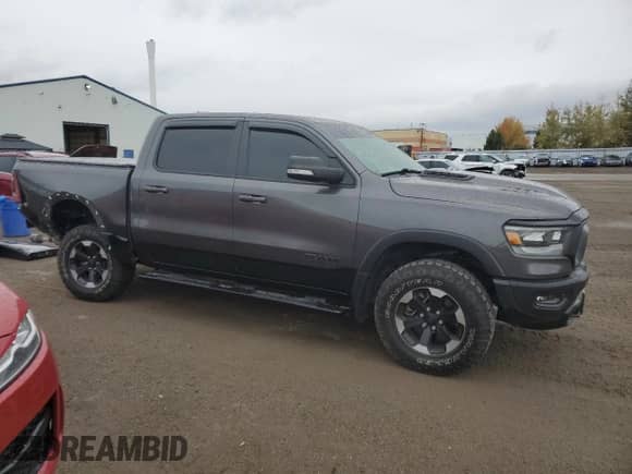 2022 Ram 1500 Rebel with VIN 1C6SRFLT1NN293092, listed as a Copart auction lot 86813755 with 60,940 mi miles and Clean title. Bid and sale history available at DreamBid. Image 4.