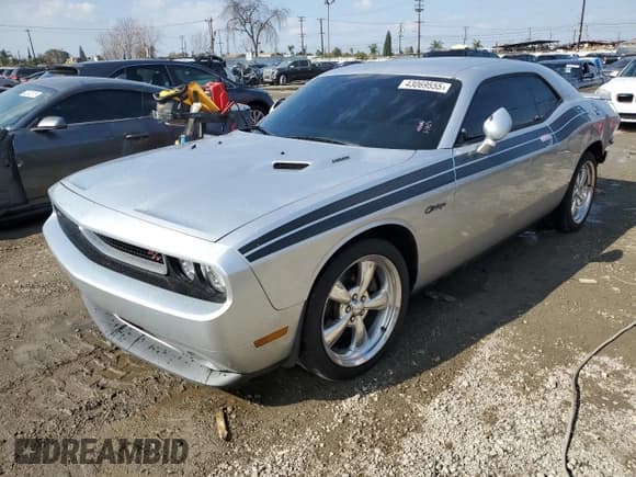 ✅ 2012 Dodge Challenger R/T Plus • VIN: 2C3CDYBT5CH154215 • Lot: 43069555. Wystawiony na Copart z przebiegiem 107 827 mil. Bezpłatny archiwum sprzedaży aukcyjnych z USA i szczegółowy raport historii pojazdu na DreamBid. Zdjęcie 1.