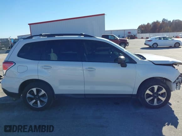 ✅ 2018 Subaru Forester • VIN: JF2SJABC7JH543921 • Lot: 43634385. Listed on IAAI with 100,699 mi. Free auction sales archive from the USA and detailed vehicle history report at DreamBid. Image 14.