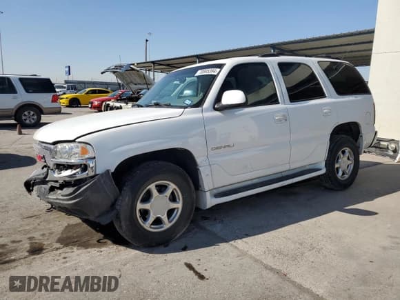 ✅ 2001 GMC Yukon Denali • VIN: 1GKEK63U61J186208 • Lot: 70895394. Listed on Copart with 207,395 mi. Free auction sales archive from the USA and detailed vehicle history report at DreamBid. Image 1.