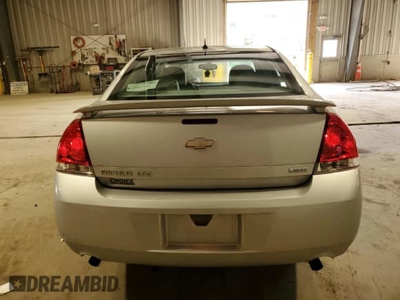 ✅ 2014 Chevrolet Impala LTZ • VIN: 2G1WC5E31E1186671 • Лот: 72442734. Опубликован ранее на Copart с пробегом 73 273 миль. Бесплатный доступ к архиву аукционных продаж из США и подробный отчёт об истории автомобиля на DreamBid. Изображение 6.