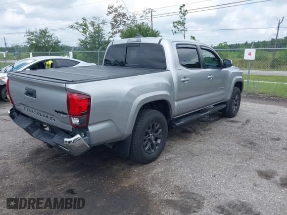 ✅ 2021 Toyota Tacoma SR5 • VIN: 3TYAZ5CN0MT003244 • Lot: 42942708. Listed on IAAI with 55,848 mi. Free auction sales archive from the USA and detailed vehicle history report at DreamBid. Image 4.