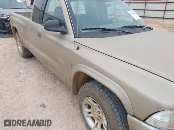 2002 Dodge Dakota SLT с VIN 1B7GL42N42S570015, выставлен на аукционе IAAI как лот 41339483 с пробегом 122 182 миль миль и . История ставок и продаж доступна на DreamBid. Изображение 6.