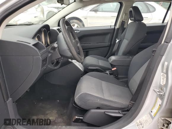 ✅ 2009 Dodge Caliber SXT • VIN: 1B3HB48A49D157720 • Лот: 86826154. Опубликован ранее на Copart с пробегом Не указан. Бесплатный доступ к архиву аукционных продаж из США и подробный отчёт об истории автомобиля на DreamBid. Изображение 7.