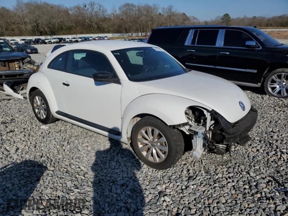 ✅ 2016 Volkswagen Beetle S • VIN: 3VWF07AT8GM630252 • Lot: 43537635. Listed on Copart with 94,350 mi. Free auction sales archive from the USA and detailed vehicle history report at DreamBid. Image 4.