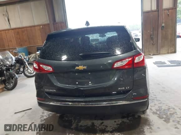 2018 Chevrolet Equinox LT z VIN 2GNAXSEV9J6347911, wystawiony jako IAAI lot #43027750 z przebiegiem 53 687 mil mil oraz . Historia ofert i sprzedaży dostępna na DreamBid. Obrazek 17.