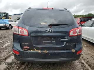 2011 Hyundai Santa Fe GLS z VIN 5XYZGDABXBG074131, wystawiony jako Copart lot #72771264 z przebiegiem 166 169 mil mil oraz Szkoda całkowita • Salvage title. Historia ofert i sprzedaży dostępna na DreamBid. Obrazek 6.