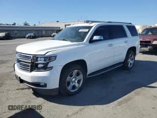 2015 Chevrolet Tahoe LTZ z VIN 1GNSCCKC4FR740428, wystawiony jako Copart lot #81438155 z przebiegiem 134 096 mil mil oraz Szkoda całkowita • Salvage title. Historia ofert i sprzedaży dostępna na DreamBid. Obrazek 1.