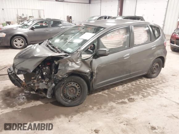 ✅ 2012 Honda Fit • VIN: JHMGE8H38CC019054 • Lot: 43691577. Listed on IAAI with 157,888 mi. Free auction sales archive from the USA and detailed vehicle history report at DreamBid. Image 18.