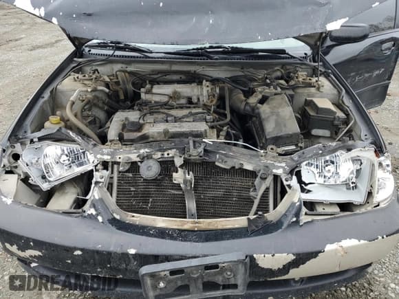 ✅ 2000 Mazda Protege DX • VIN: JM1BJ2221Y0266722 • Lot: 77600224. Wystawiony na Copart z przebiegiem 188 427 mil. Bezpłatny archiwum sprzedaży aukcyjnych z USA i szczegółowy raport historii pojazdu na DreamBid. Zdjęcie 11.