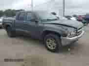 2003 Dodge Dakota SLT z VIN 1D7HL48N93S225937, wystawiony jako Copart lot #72817914 z przebiegiem 168 204 mil mil oraz Czysty tytuł • Clean title. Historia ofert i sprzedaży dostępna na DreamBid. Obrazek 4.