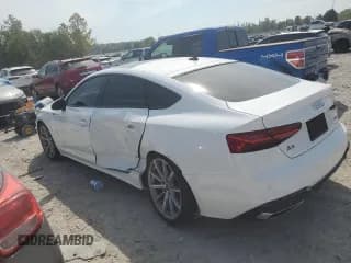 ✅ 2025 Audi A5 Sportback S line Premium • VIN: WAUDACF50SA015238 • Лот: 81313795. Опубликован ранее на Copart с пробегом 16 155 миль. Бесплатный доступ к архиву аукционных продаж из США и подробный отчёт об истории автомобиля на DreamBid. Изображение 2.