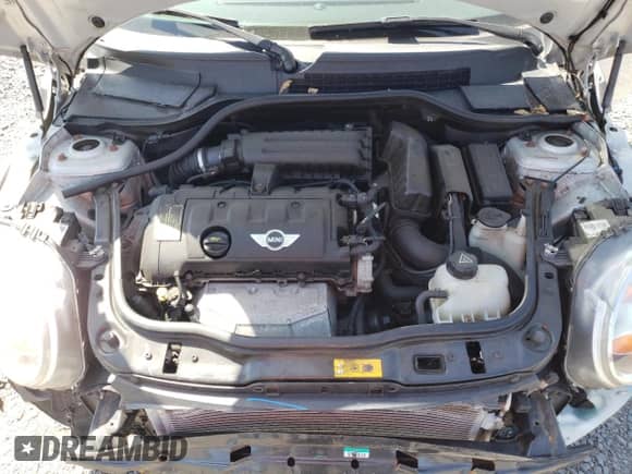 2013 MINI Hardtop with VIN WMWSU3C57DT546947, listed as a Copart auction lot 62088645 with 99,944 mi miles and Salvage title. Bid and sale history available at DreamBid. Image 11.