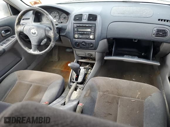 ✅ 2002 Mazda Protege DX • VIN: JM1BJ226121630366 • Lot: 75128894. Wystawiony na Copart z przebiegiem Nie podano. Bezpłatny archiwum sprzedaży aukcyjnych z USA i szczegółowy raport historii pojazdu na DreamBid. Zdjęcie 8.