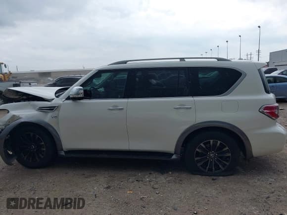 ✅ 2018 Nissan Armada Platinum • VIN: JN8AY2ND7J9054952 • Lot: 42420474. Listed on IAAI with 104,896 mi. Free auction sales archive from the USA and detailed vehicle history report at DreamBid. Image 14.