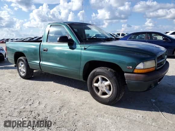 2000 Dodge Dakota с VIN 1B7FL26X0YS599337, выставлен на аукционе Copart как лот 73826624 с пробегом 146 688 миль миль и Списание • Salvage title. История ставок и продаж доступна на DreamBid. Изображение 4.