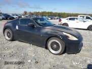 ✅ 2009 Nissan 370Z • VIN: JN1AZ44EX9M404083 • Lot: 91008375. Listed on Copart with 185,773 mi. Free auction sales archive from the USA and detailed vehicle history report at DreamBid. Image 4.