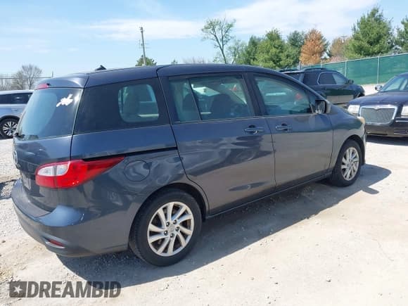 ✅ 2012 Mazda 5 Sport • VIN: JM1CW2BL8C0110989 • Lot: 42070091. Listed on IAAI with 320,397 mi. Free auction sales archive from the USA and detailed vehicle history report at DreamBid. Image 4.