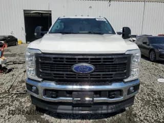 ✅ 2023 Ford F-350 • VIN: 1FT8W3BAXPED51651 • Лот: 69656364. Опубликован ранее на Copart с пробегом 21 593 миль. Бесплатный доступ к архиву аукционных продаж из США и подробный отчёт об истории автомобиля на DreamBid. Изображение 5.