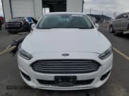 ✅ 2016 Ford Fusion Titanium • VIN: 3FA6P0SU8GR194217 • Lot: 82210555. Wystawiony na Copart z przebiegiem 128 596 mil. Bezpłatny archiwum sprzedaży aukcyjnych z USA i szczegółowy raport historii pojazdu na DreamBid. Zdjęcie 5.