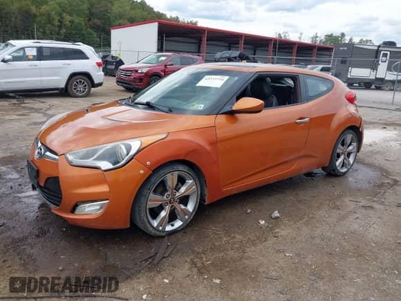 2012 Hyundai Veloster w/Red Int with VIN KMHTC6AD1CU022400, listed as a IAAI auction lot 43233734 with 203,900 mi miles and . Bid and sale history available at DreamBid. Image 20.