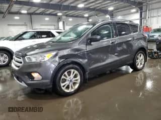 2018 Ford Escape SE z VIN 1FMCU9GD3JUB57039, wystawiony jako Copart lot #65642995 z przebiegiem 154 325 mil mil oraz Szkoda całkowita • Salvage title. Historia ofert i sprzedaży dostępna na DreamBid. Obrazek 1.