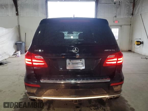 ✅ 2015 Mercedes-Benz GL 63 AMG • VIN: 4JGDF7EEXFA455501 • Лот: 70600545. Опубликован ранее на Copart с пробегом 123 925 миль. Бесплатный доступ к архиву аукционных продаж из США и подробный отчёт об истории автомобиля на DreamBid. Изображение 6.