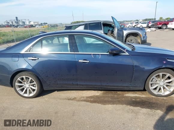 ✅ 2016 Cadillac CTS Premium Luxury AWD • VIN: 1G6AY5SS7G0116673 • Lot: 43218927. Listed on IAAI with 82,706 mi. Free auction sales archive from the USA and detailed vehicle history report at DreamBid. Image 13.