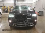 ✅ 2015 Jeep Grand Cherokee Overland • VIN: 1C4RJFCM8FC815544 • Lot: 80519904. Listed on Copart with 132,490 mi. Free auction sales archive from the USA and detailed vehicle history report at DreamBid. Image 5.