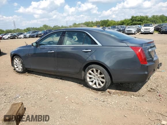 ✅ 2014 Cadillac CTS AWD • VIN: 1G6AW5SX2E0184751 • Lot: 67534565. Listed on Copart with 104,735 mi. Free auction sales archive from the USA and detailed vehicle history report at DreamBid. Image 2.