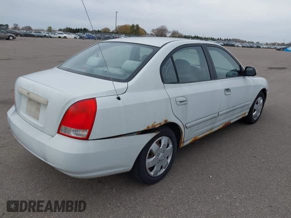 ✅ 2001 Hyundai Elantra GLS • VIN: KMHDN45D51U054762 • Lot: 43640400. Listed on IAAI with 213,721 mi. Free auction sales archive from the USA and detailed vehicle history report at DreamBid. Image 4.