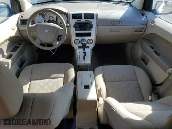 2007 Dodge Caliber SXT with VIN 1B3JB48B07D502636, listed as a Copart auction lot 76928234 with 67,542 mi miles and Salvage title. Bid and sale history available at DreamBid. Image 8.