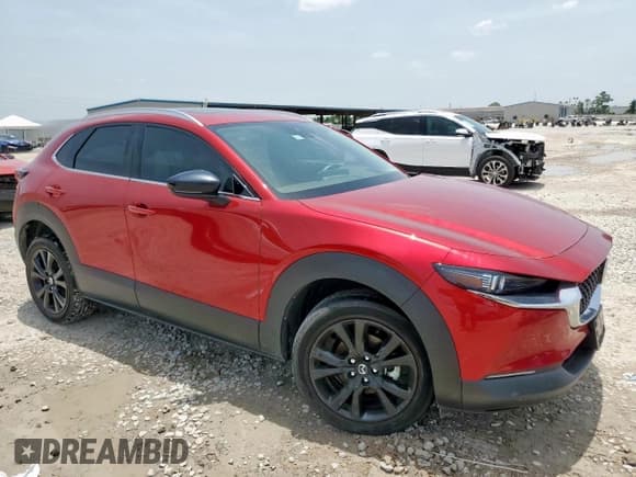 ✅ 2023 Mazda CX-30 Premium • VIN: 3MVDMBDY8PM570075 • Lot: 63523185. Listed on Copart with 10,939 mi. Free auction sales archive from the USA and detailed vehicle history report at DreamBid. Image 4.