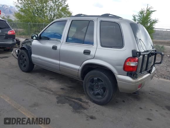 ✅ 2000 Kia Sportage • VIN: KNDJA7231Y5651234 • Lot: 42100284. Listed on IAAI with 192,122 mi. Free auction sales archive from the USA and detailed vehicle history report at DreamBid. Image 3.