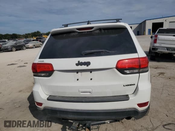 ✅ 2015 Jeep Grand Cherokee Laredo • VIN: 1C4RJEAG1FC669883 • Lot: 85857515. Listed on Copart with 228,860 mi. Free auction sales archive from the USA and detailed vehicle history report at DreamBid. Image 6.