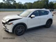 ✅ 2021 Mazda CX-5 Sport • VIN: JM3KFABM6M1314840 • Lot: 71228595. Wystawiony na Copart z przebiegiem 111 170 mil. Bezpłatny archiwum sprzedaży aukcyjnych z USA i szczegółowy raport historii pojazdu na DreamBid. Zdjęcie 1.