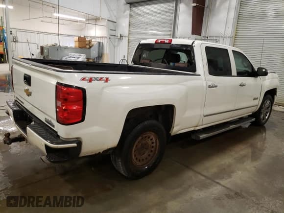 ✅ 2014 Chevrolet Silverado 1500 High Country • VIN: 3GCUKTEJ1EG353512 • Лот: 84939764. Опубликован ранее на Copart с пробегом 162 498 миль. Бесплатный доступ к архиву аукционных продаж из США и подробный отчёт об истории автомобиля на DreamBid. Изображение 3.