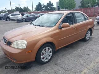 ✅ 2004 Suzuki Forenza S • VIN: KL5JD52Z64K943267 • Lot: 42249733. Wystawiony na IAAI z przebiegiem 40 122 mil. Bezpłatny archiwum sprzedaży aukcyjnych z USA i szczegółowy raport historii pojazdu na DreamBid. Zdjęcie 2.