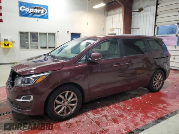✅ 2020 Kia Sedona LX • VIN: KNDMB5C1XL6577195 • Lot: 92217215. Listed on Copart with 128,392 mi. Free auction sales archive from the USA and detailed vehicle history report at DreamBid. Image 1.