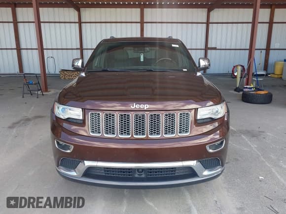 ✅ 2015 Jeep Grand Cherokee Summit • VIN: 1C4RJEJG2FC829205 • Lot: 43469676. Listed on IAAI with 89,893 mi. Free auction sales archive from the USA and detailed vehicle history report at DreamBid. Image 6.