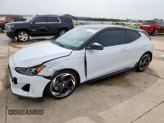 2019 Hyundai Veloster Turbo z VIN KMHTH6AB9KU004399, wystawiony jako Copart lot #71371085 z przebiegiem 80 416 mil mil oraz Czysty tytuł • Clean title. Historia ofert i sprzedaży dostępna na DreamBid. Obrazek 1.