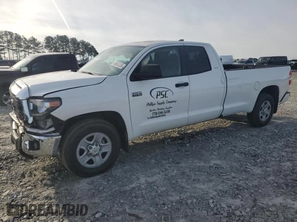 ✅ 2021 Toyota Tundra SR • VIN: 5TFTY5F18MX012087 • Lot: 88883235. Listed on Copart with 81,059 mi. Free auction sales archive from the USA and detailed vehicle history report at DreamBid. Image 1.